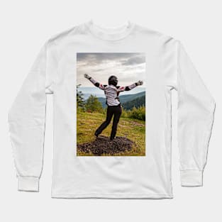 Happy biker with her hands up against mountain view Long Sleeve T-Shirt